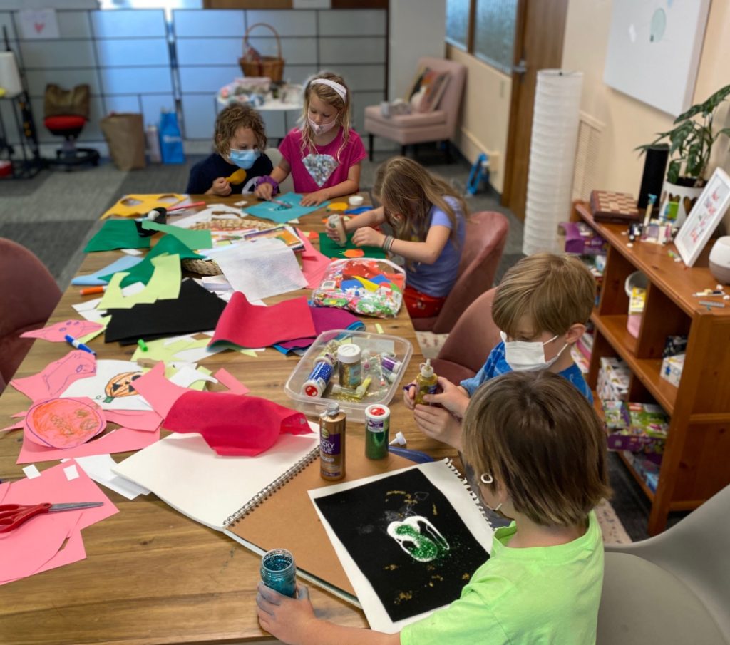 kids doing crafts at VIDA Coworking's childcare in portland, oregon