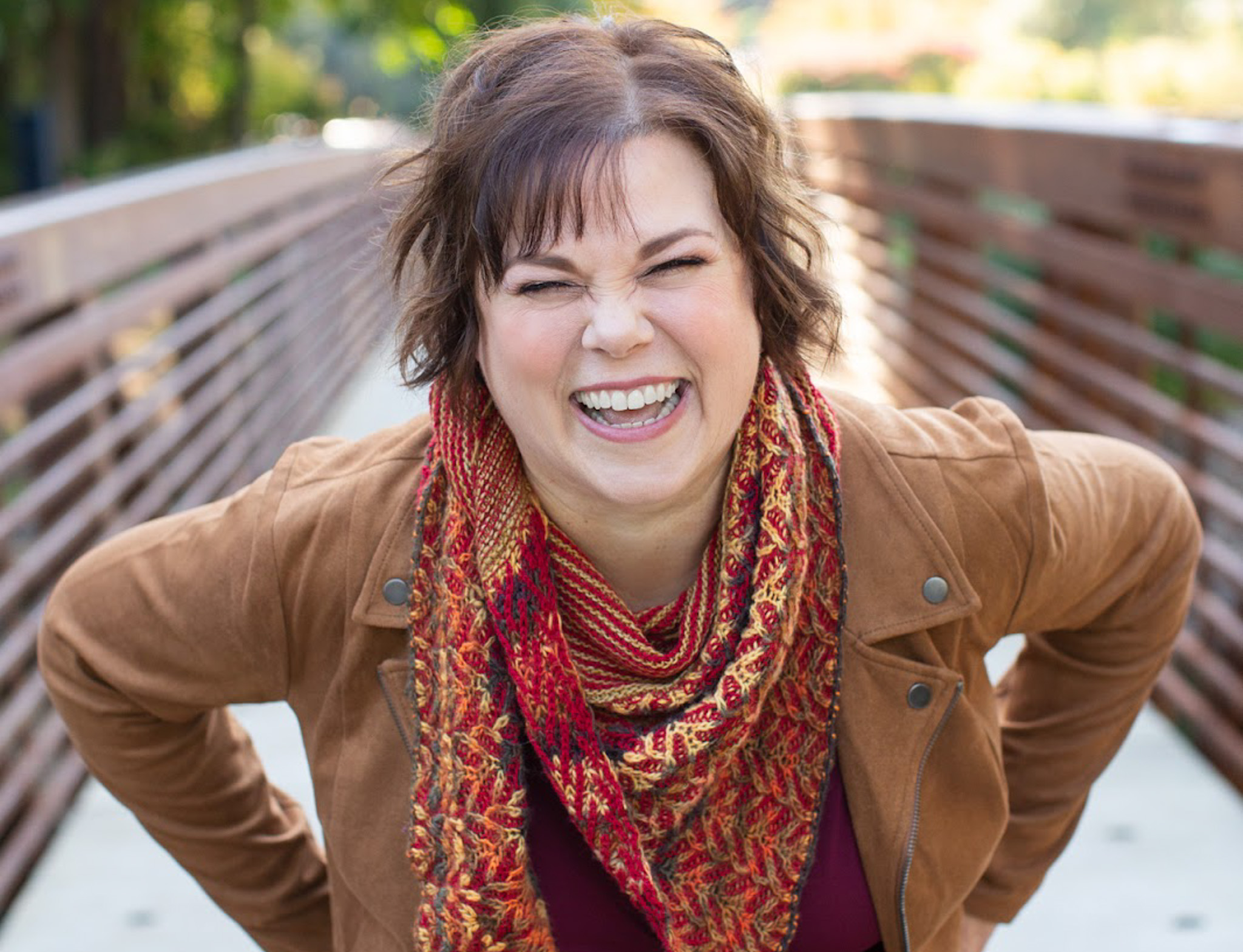 Connie Vanderzanden smiling on a bridge in portland, or