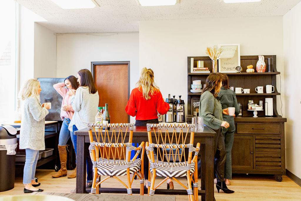 People milling about in VIDA's shared kitchen space