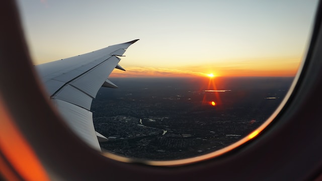 looking out a plane window in the air